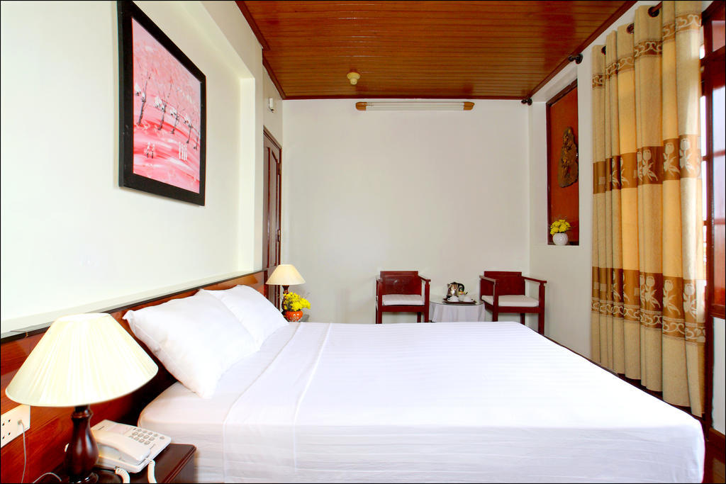 Nhi Trung Hotel Hoi An Værelse billede