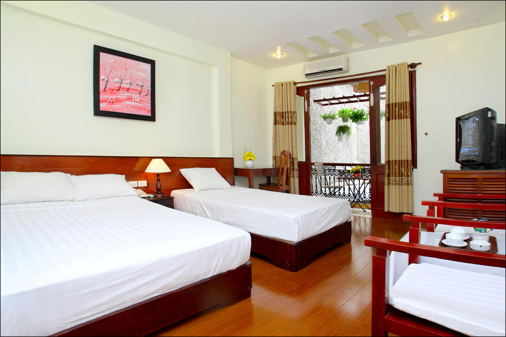 Nhi Trung Hotel Hoi An Værelse billede